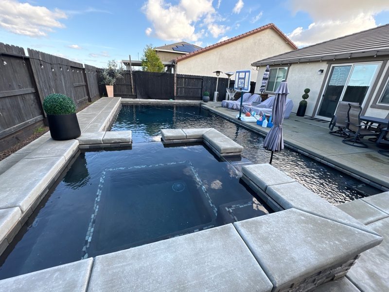 Modern pool and spa combo with weekly maintenance by Private Oasis Pools